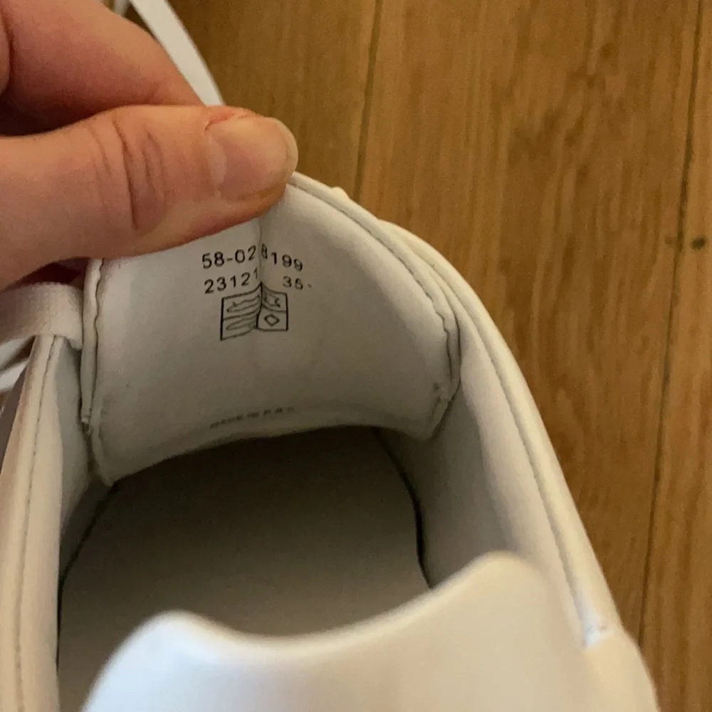 Balmain White Leather Sneakers with Gold Logo Strap